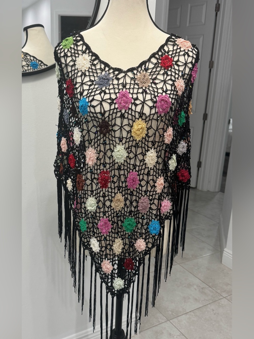 Y2K
Black Crochet Floral Fringe Poncho with Multicolor Flowers - Picture 3 of 7